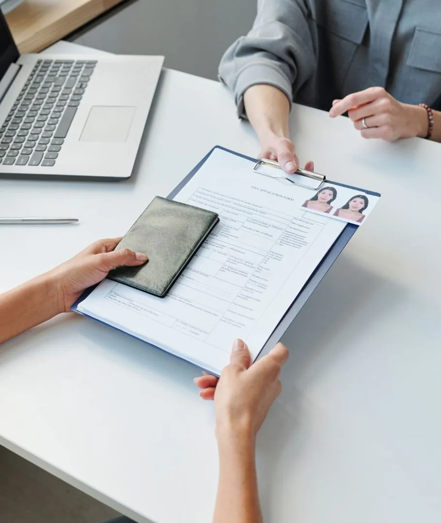A family meeting with their immigration attorney in a warm, welcoming office